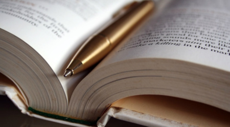 Notulen, boek en pen